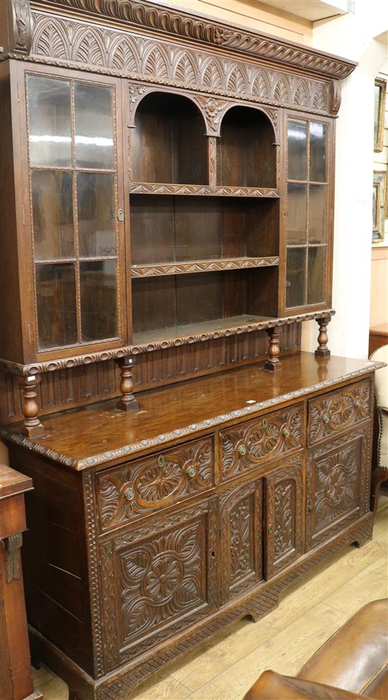 A 1902s carved oak dresser, W.176cm